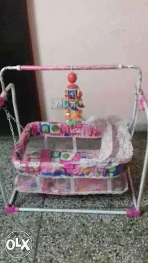 Baby's Pink And White Swing Chair