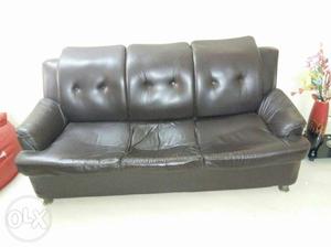 Black coloured sofa set. Two 3 seater sets.