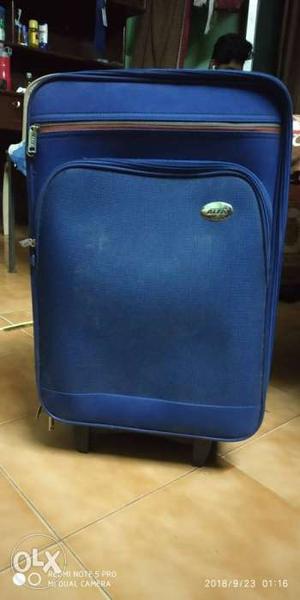 Blue And Black Luggage Bag