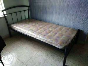 Brand new wrought iron bed with new mattress