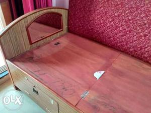 Brown Wooden Bed without mattress