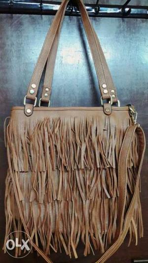 Brown clour georges bag..unued..fixed price...plz