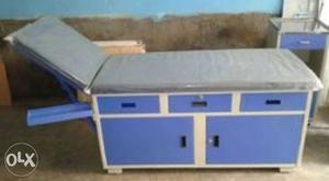 Examination table for doctors with big space for
