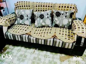 Fresh sofa set with golden cover