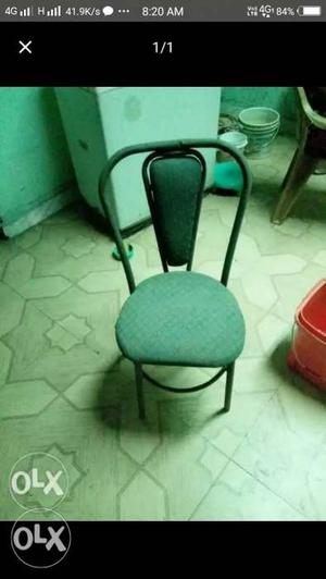 Green And Black Metal Chair