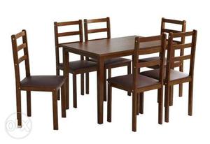 Mint Condition Six Seater Dining Table By HomeTown (Wooden)