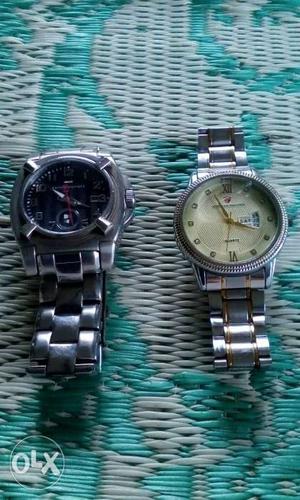 One black dial is Tommy Hilfiger & other one