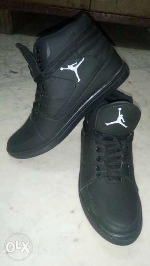 Pair Of Black Air Jordan Basketball Shoes