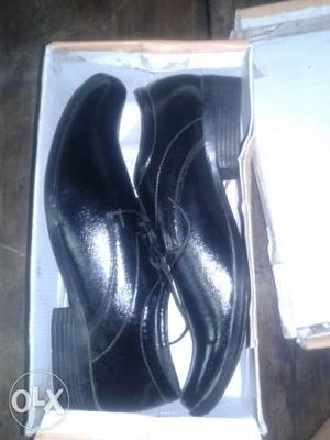 Pair Of Black Leather Dress Shoes .1 very urgent