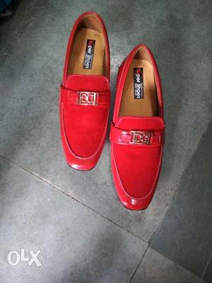 Pair Of Red Suede Loafers