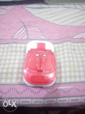 Red And White Plastic Toy Car