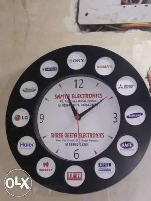 Round Black And White Samta Electronics Wall Clock