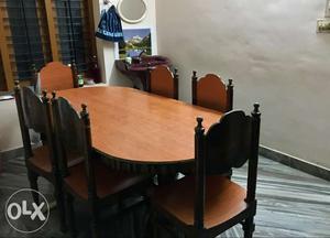 Teakwood Dining table with 6 chairs.