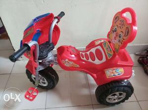 Toddler's Red And Black Ride On Toy. Cycle/Riksha