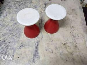 Two Red And White Plastic Stools