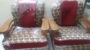 Two Red-and-brown Floral Sofa Chairs