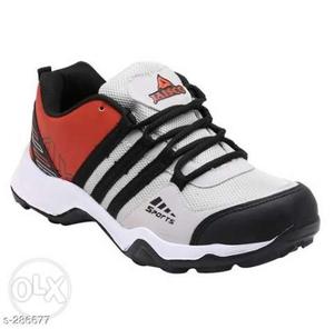Unpaired Gray And Black Nike Running Shoe