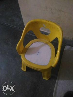 Yellow And Black Plastic Chair