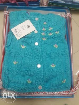New born sweaters with cap and socks. A lot more