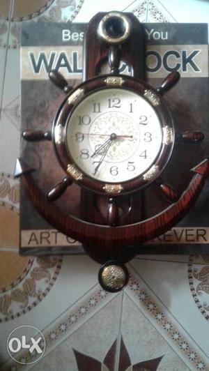 New wall clock in brownish colour
