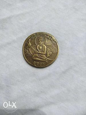 Round Gold-colored Coin