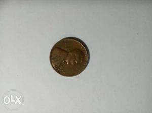 Round Gold-colored Lincoln Cent Coin