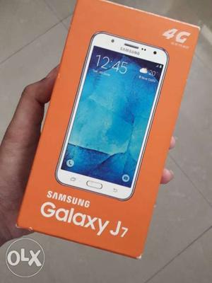 Samsung j7 with box available.