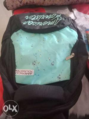 Teal And Black Jansport Backpack