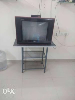 Tv with tv stand and Tata sky