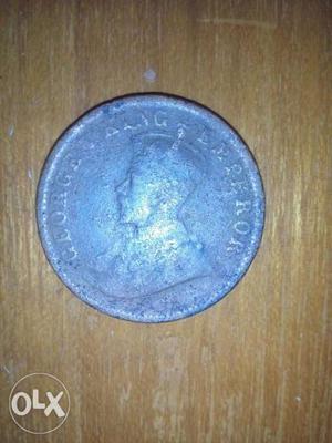 Round Blue And Gray Coin