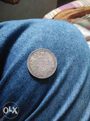 Round Silver-colored Coin