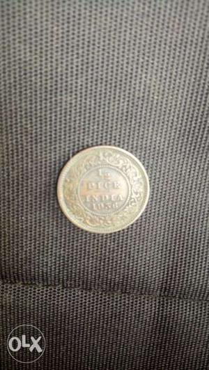 Round coper metalic-colored Coin 