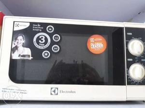 White And Black Electrolux Microwave Oven
