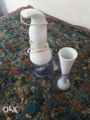White Ceramic Pitcher And Cup