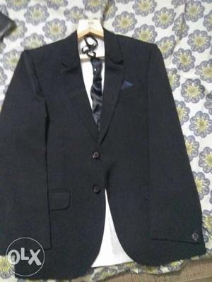 Charming blazer with pant and tie. Size no 10.
