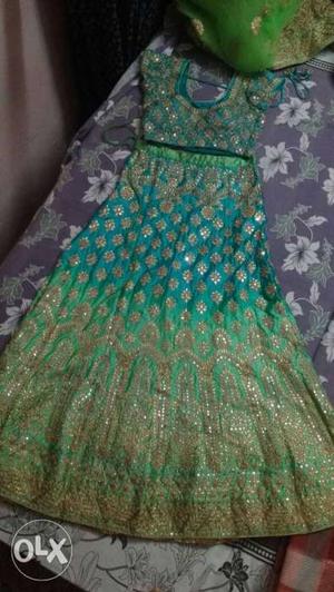 Green and blue party wear lehnga only one time