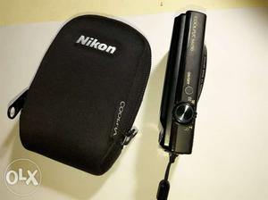 Nikon coolpix s camera with camera cover and