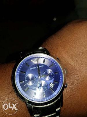 Round Silver Chronograph Watch With silver bracelet