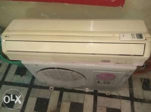 White LG Split-type Air Conditioner And Outdoor Air
