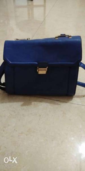 Blue color stylish hand bag +sling bag good