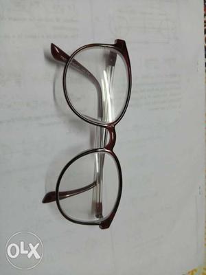 Maroon coloured specs frame, flexible, light