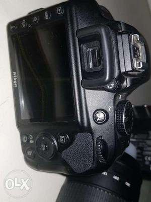 Nikon D DSLR camera body with dual lens:AF-P