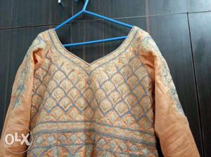 Peach colour embroided gown with dupatta gown is