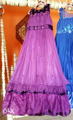 Purple partywear gown for 10 to 12 years girl in