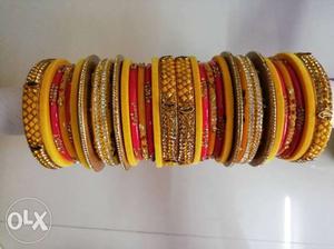 Red And Gold-colored Beaded Bracelets