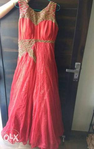 Red couler single gown dress nice condition I