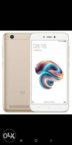 Redmi 5a 2gb 16gb gold colour sealpack with bill, fix rate.