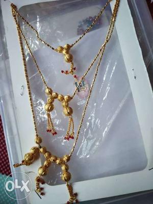 Three layer Gold-colored red beaded Necklace Without