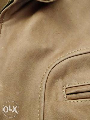 100% pure leather jacket in tan colour, in good