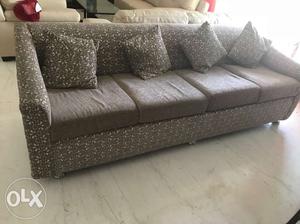 4-seater sofa with cushions in excellent